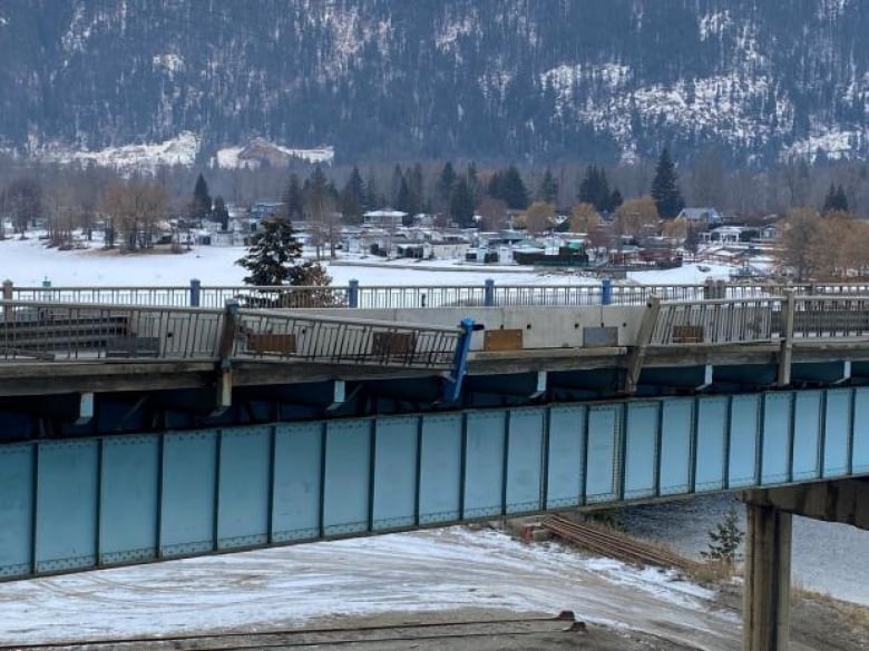 A bridge with damaged railing