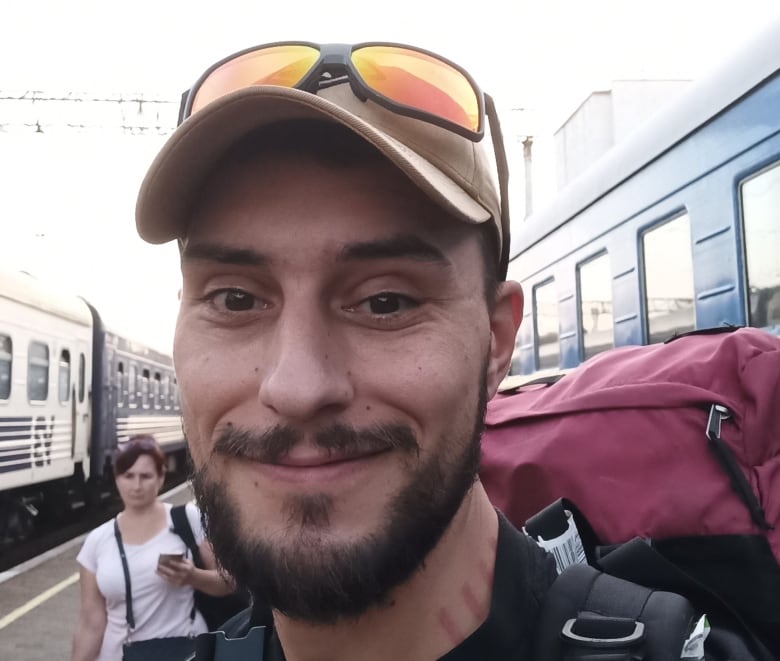 Canadian Joshua Cabral is seen at a train station in the Ukrainian city of Zaporizhzhia in June 2024.