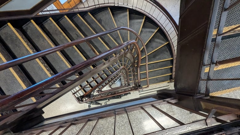 A top-down view of stairs in a triangular shape.