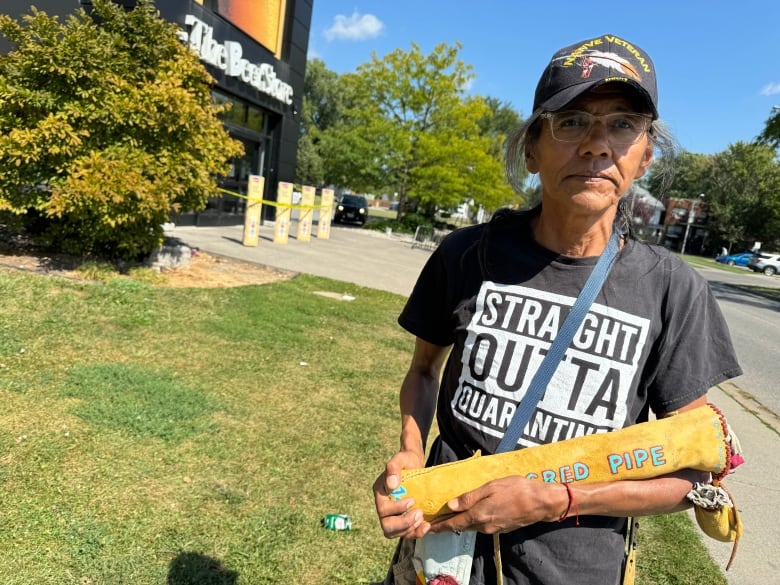 Steven Mull stands in front of the Beer Store