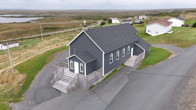 an aerial view of a catholic church on the southern Avalon Peninsula.