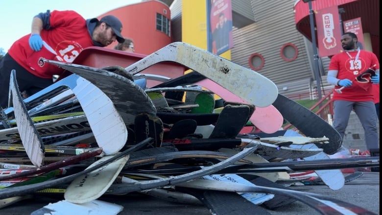 Hockey sticks left at a memorial to honour Johnny Gaudreau will be repurposed into benches that will be used in fundraising efforts for local Calgary charities.