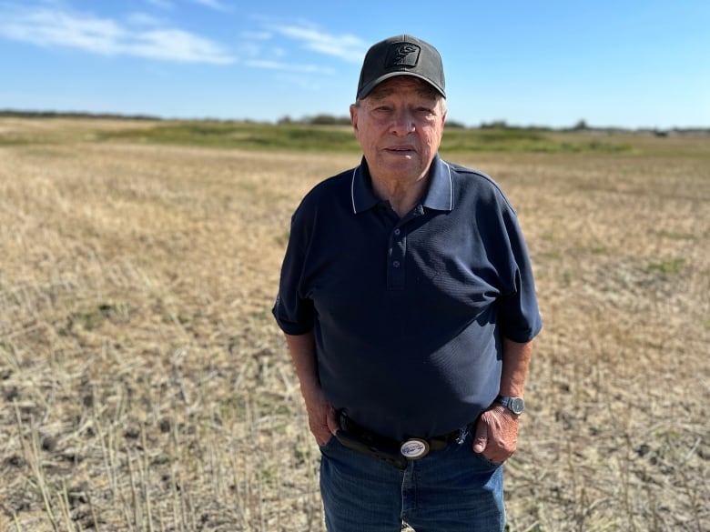 A man in a cap. 