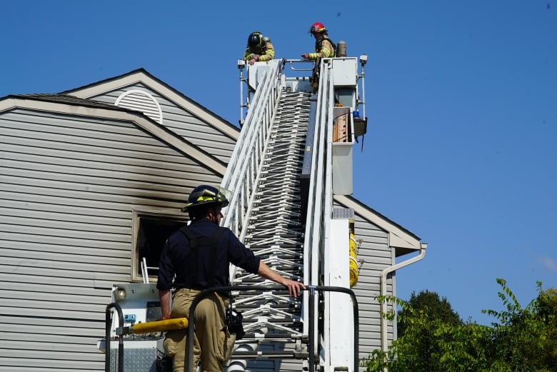 Fire crews used an truck-mounted boom to access the roof of the building.