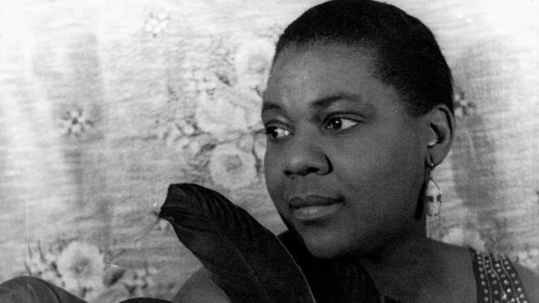 A black and white photo of Bessie Smith looking to the left.