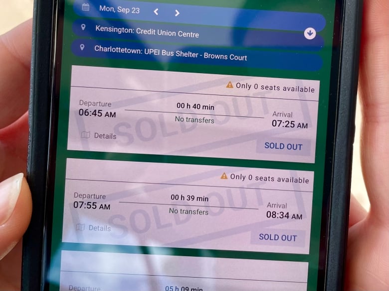 A phone shows the T3 Transit booking website.  But morning departures from Summerside are showing as 'sold out.'