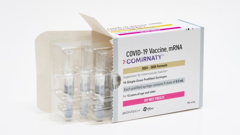 Packaging for the Pfizer's updated COVID vaccine for ages 12 and up is shown in an August 2024 photo.