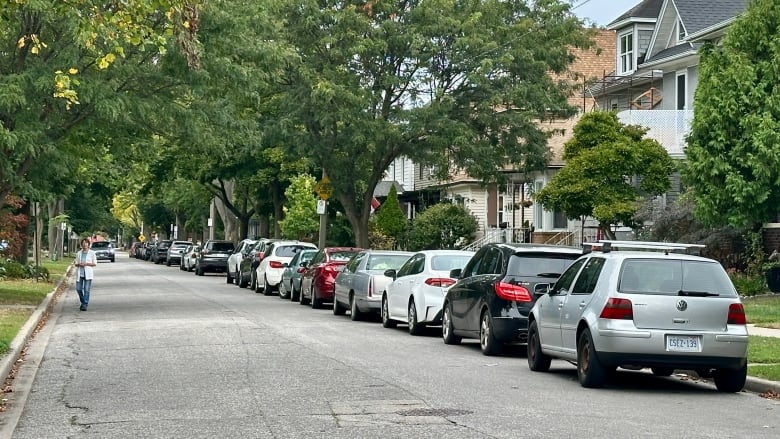 A residential road with street parking.