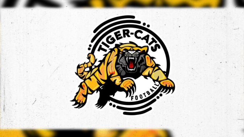 A logo with a tiger leaping and it reads 