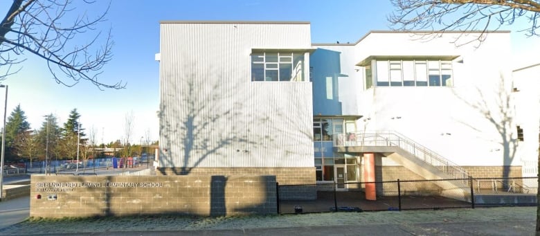 A white school building, with the words 'Sir Sandford Fleming Elementary School'.