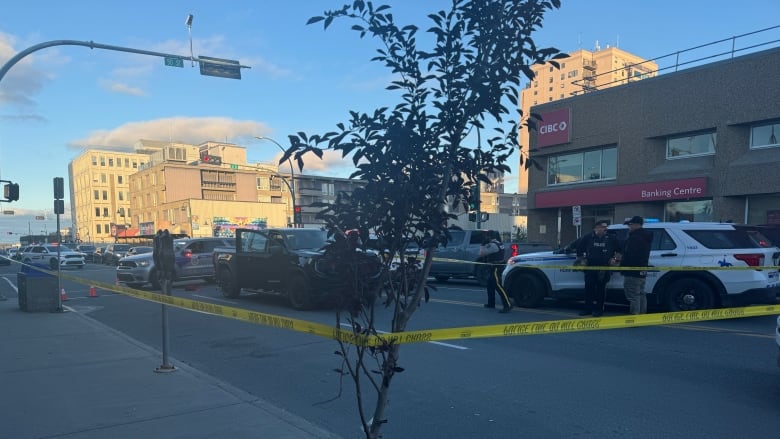 intersection with police blocked off by police tape