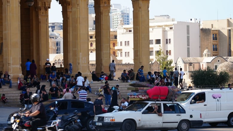 People pack the stairs of Al-Amin Mosque in central Beirut.