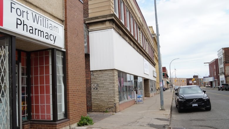 A pharmacy is shown on a street in Thunder Bay