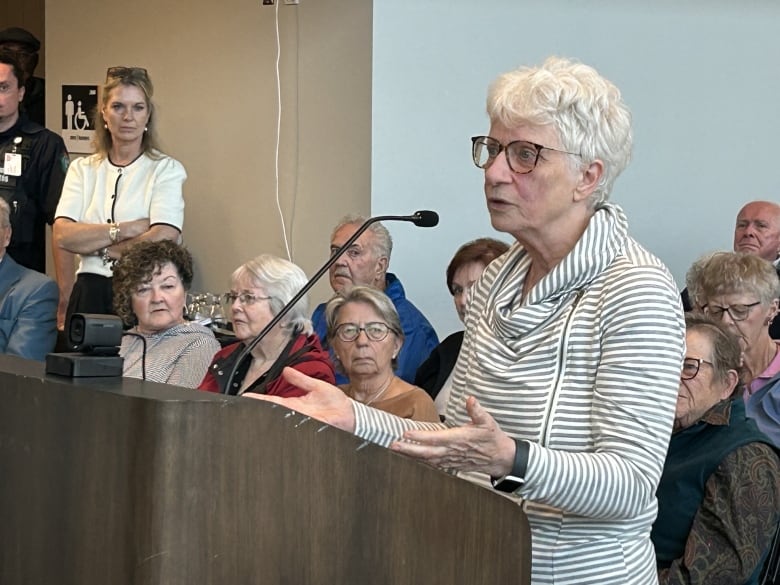 A white lady with white hair.