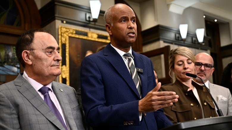 Minister of International Development Ahmed Hussen is joined by cabinet ministers, Liberal MPs and leaders from aid organizations at a news conference on humanitarian assistance for Lebanon, in the Foyer of the House of Commons on Parliament Hill in Ottawa on Wednesday, Oct. 9, 2024.