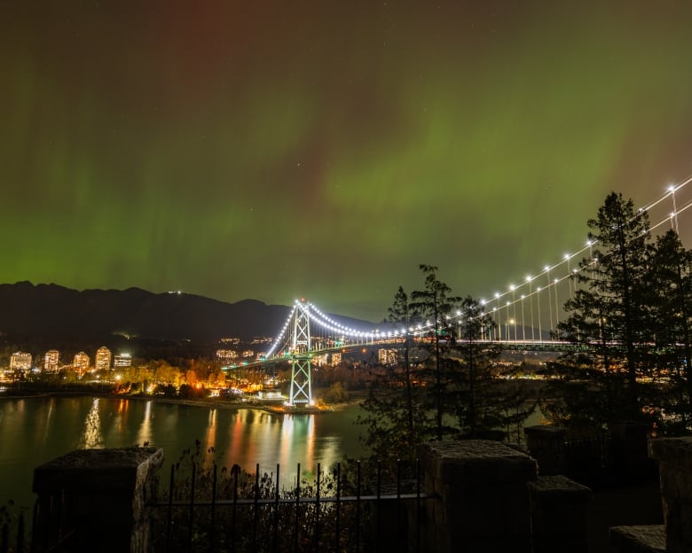 Green lights above the Lions Gate Bridge 