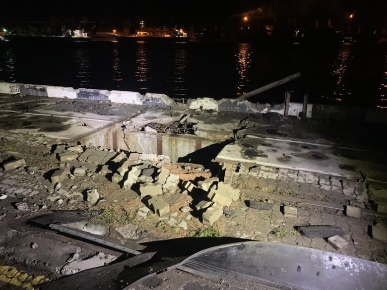 A crater left by a missile strike at the Odesa port.