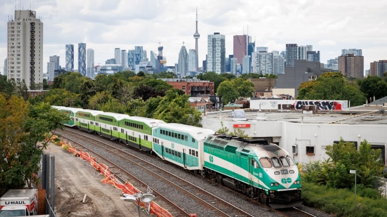 A Go Train is pictured on on Aug. 21, 2024. The light rail line passes near 25 properties on Pape Ave., in Toronto, that will be expropriated for construction of the Ontario Line subway.