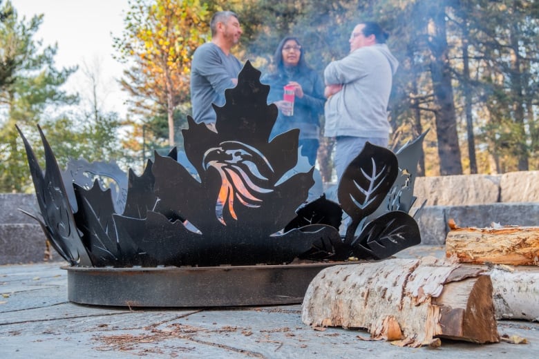 A close-up of a fire pit outside.