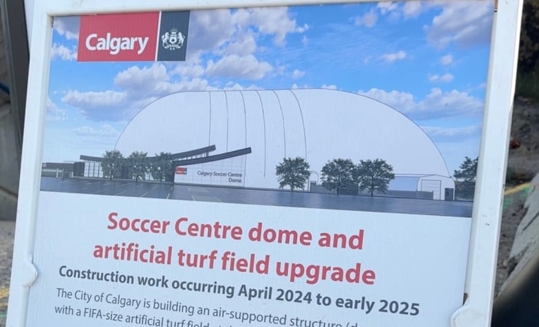 A sign stands outside the Calgary Soccer Centre informing visitors of the work happening to build a new indoor pitch, which should be in use in 2025. 