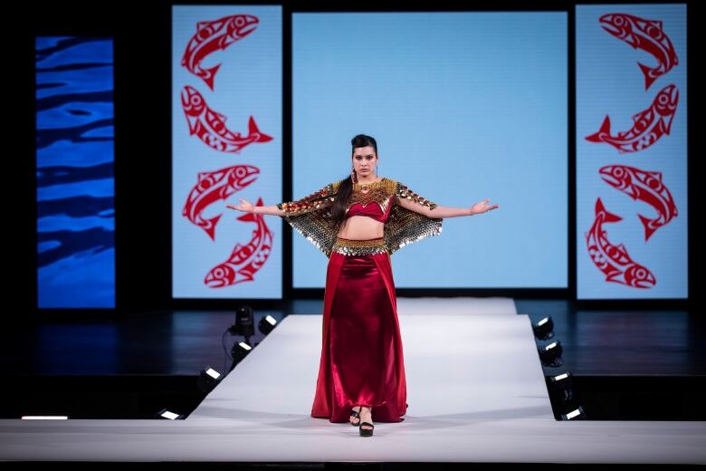 Alicia Hanton walks the runway for Yolonda Skelton during the opening night of the Vancouver Indigenous Fashion Week in Vancouver, British Columbia on Monday, November 21, 2023. 