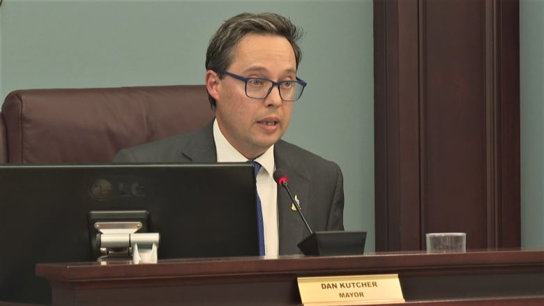 Dan Kutcher speaking at his desk in the Summerside council chamber.