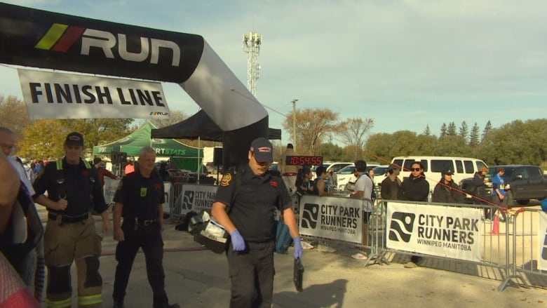 An inflatable arch marks the finish line of a marathon