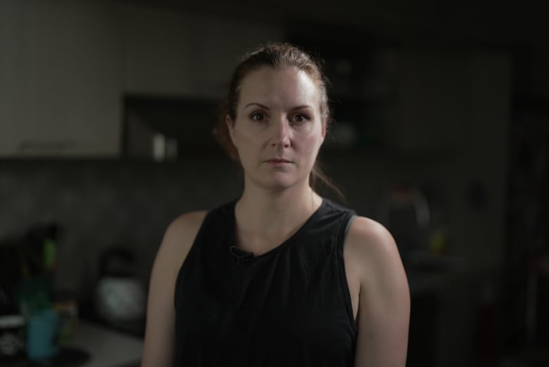 A woman in a kitchen.