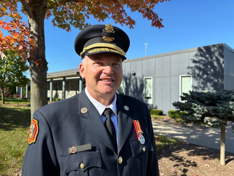 A man in a firefighters dress uniform