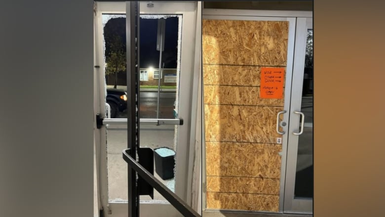 A photo shows a boarded-up door next to an image of a door with shattered glass. 