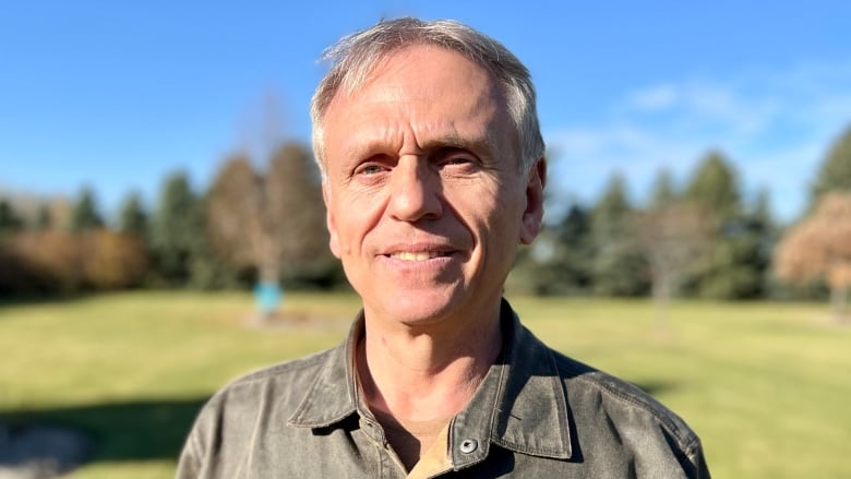 A man standing in a field.