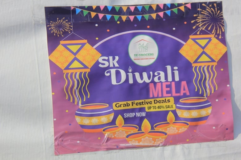 Purples Diwali poster placed on tent.