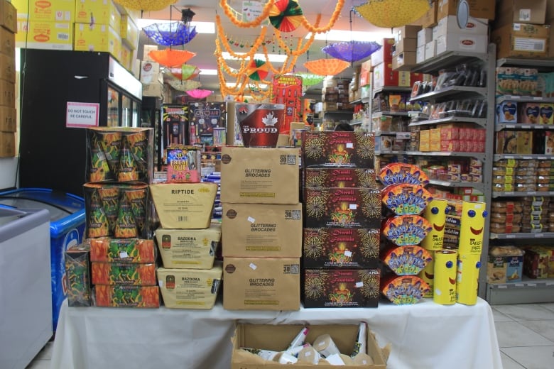 Display items on a table at a Diwali event.