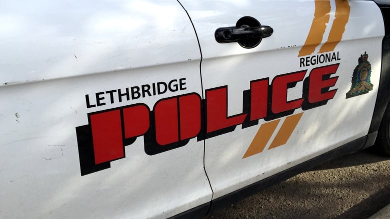 Close up of side panel of cruiser showing logo for Lethbridge Regional Police.