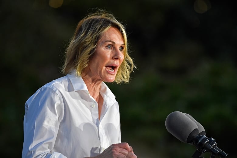 Kelly Craft, former U.S. Ambassador to Canada, stands on the steps of the Barren County Courthouse to announce her candidacy for Kentucky governor in Glasgow, Ky., Tuesday, Sept. 13, 2022.