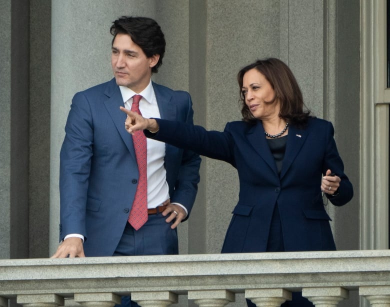 Prime Minister Justin Trudeau takes in the view with United States Vice-President Kamala Harris from the balcony outside her office in Washington, D.C., Thursday, Nov. 18, 2021.