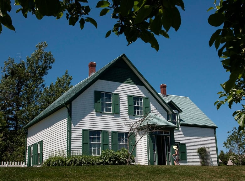 A young girl enters Green Gables House in Cavendish, Prince Edward Island on Sunday, July 3, 2011. The site is considered the inspiration for the setting in Lucy Maud Montgomery's classic tale of fiction, Anne of Green Gables.