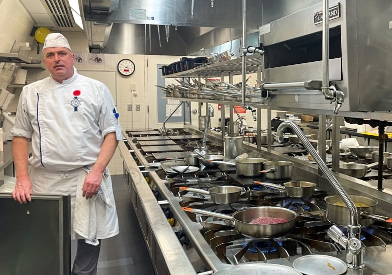 A man in a kitchen