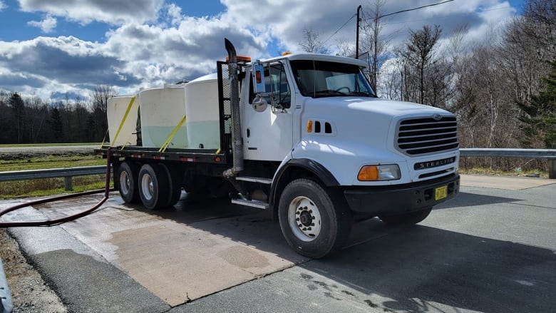 A large water truck is shown