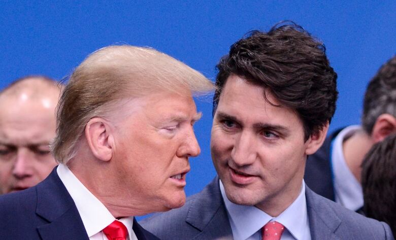 Prime Minister Justin Trudeau and U.S. President Donald Trump arrive to take part in a plenary session at the NATO Summit in Watford, Hertfordshire, England, on Wednesday, Dec. 4, 2019.